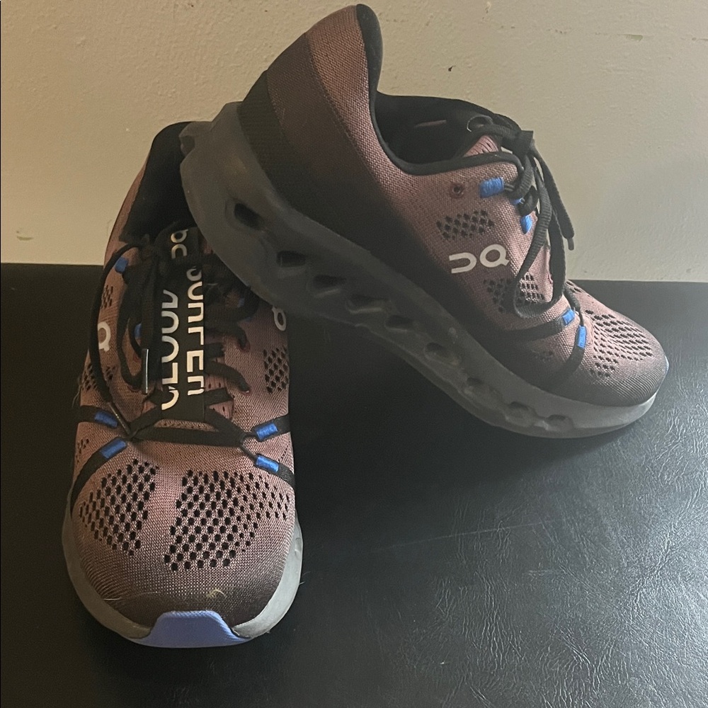 On Running Black and Brown Athletic Shoes